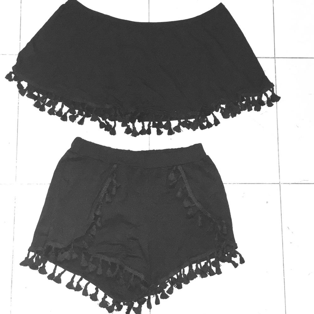 Black two piece outfit with fringe detail